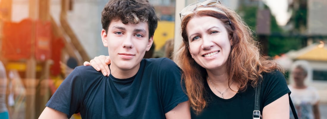 A teen boy with his mother